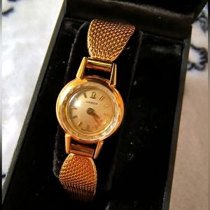 Omega24.8g 18k solid gold (755Helvetia Head stamp)